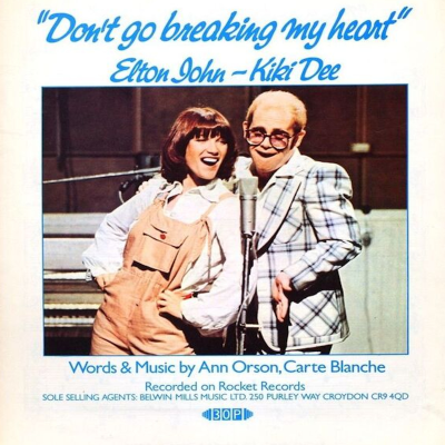 episode «Don’t Go Breaking My Heart», el éxito de Elton John y Kiki Dee artwork